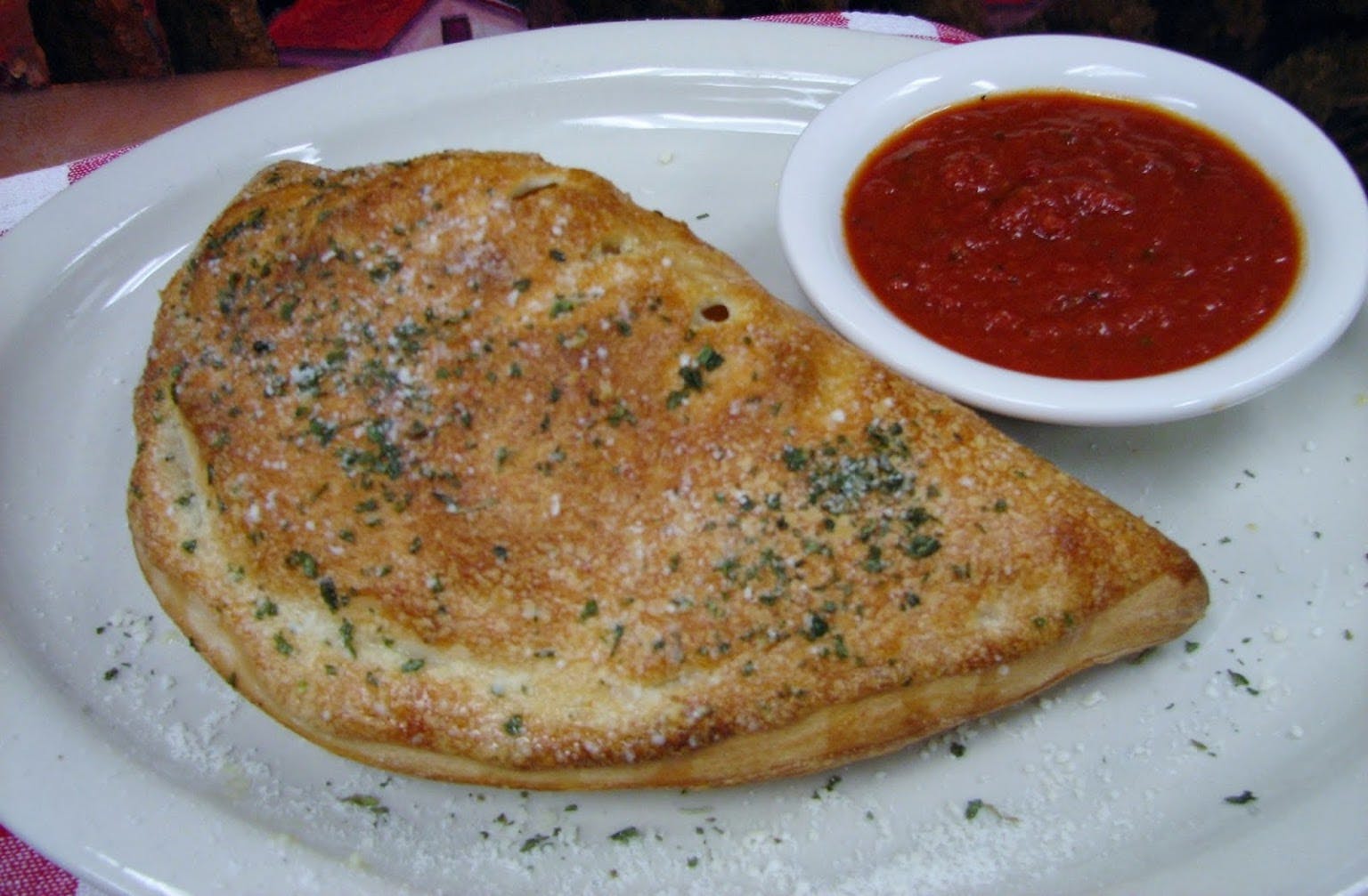 Order Cheese Calzone - Calzone food online from Stella Mia Pizzeria store, Staunton on bringmethat.com