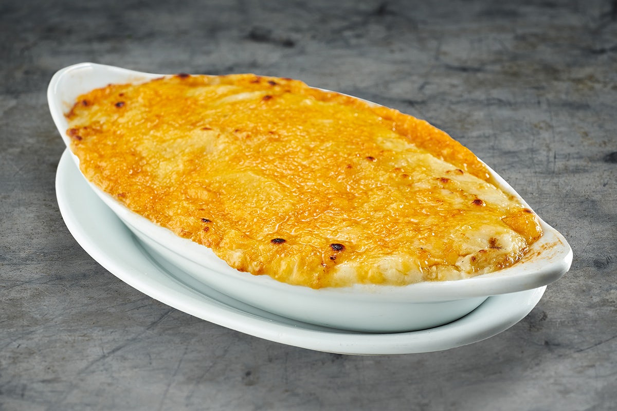 Order POTATOES AU GRATIN food online from Ruth's Chris Steak House store, New Orleans on bringmethat.com