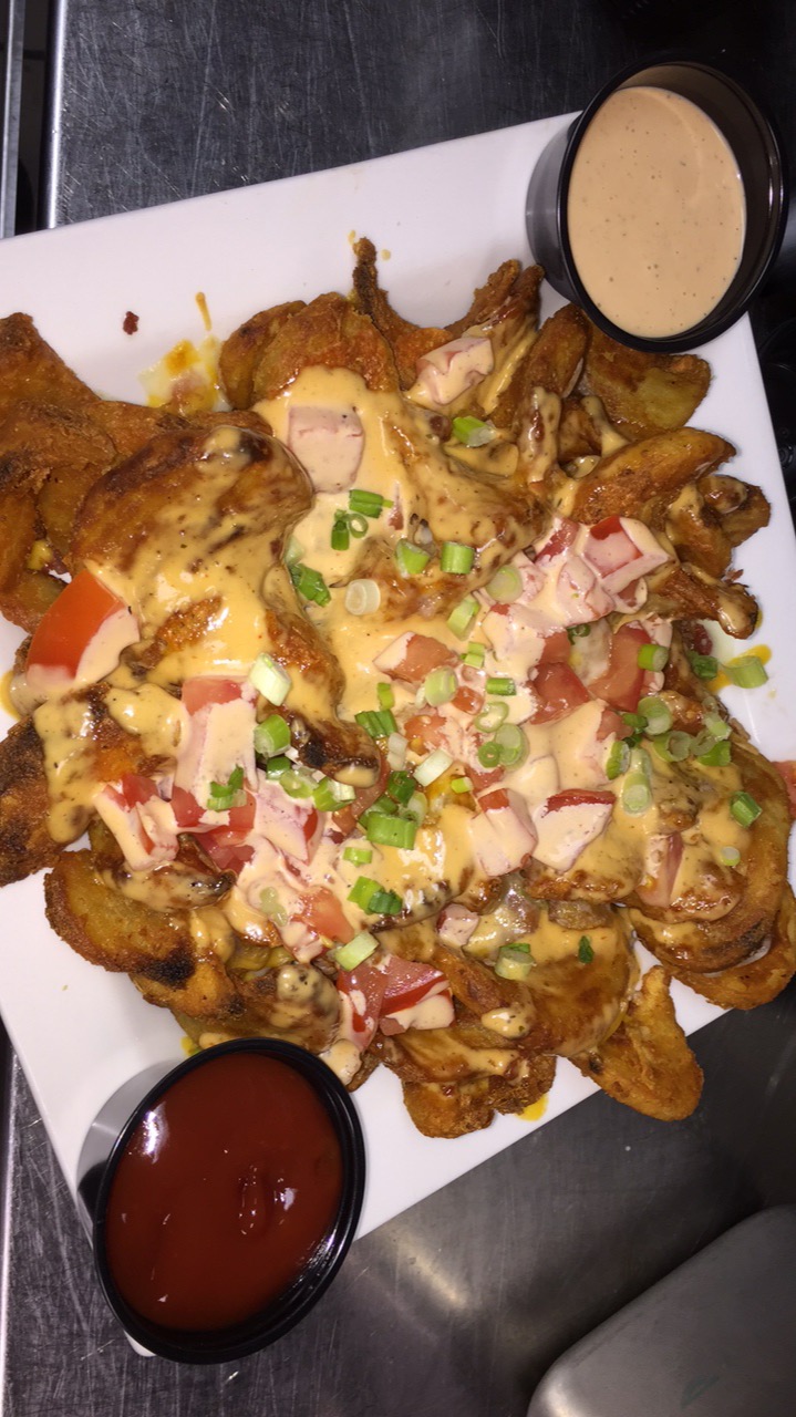Order Loaded Fries food online from Shakers Bar and Grill store, Wixom on bringmethat.com
