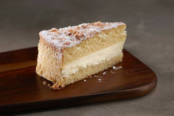 Order Lemon Italian Cream Cake food online from Ruby Tuesday store, Hinesville on bringmethat.com