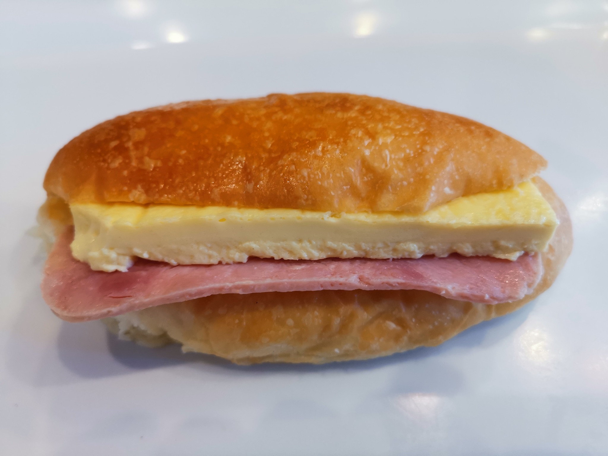 Order Ham and Egg Bun 腿蛋包 food online from Pineapple King Bakery store, San Francisco on bringmethat.com