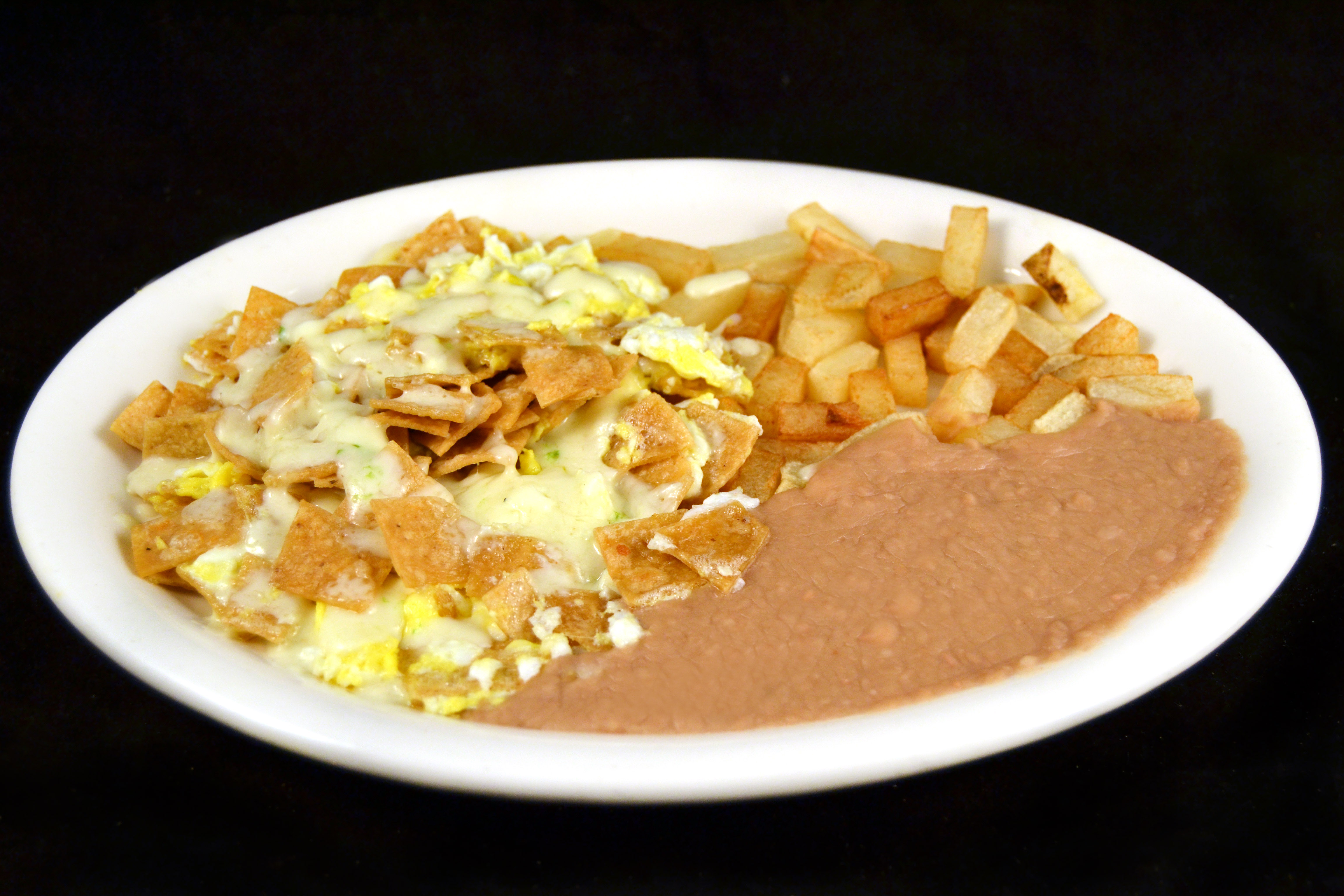 Order Migas food online from Mi Comal Mexican Restaurant store, Irving on bringmethat.com