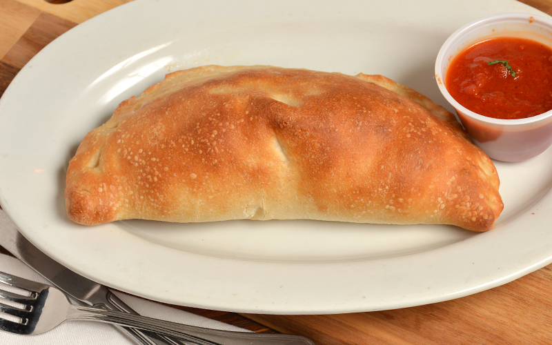 Order Cheese Calzone food online from Cinelli's Pizza store, Franklin Square on bringmethat.com
