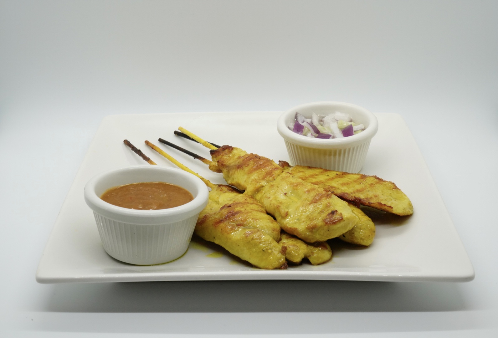 Order 4. Five Pieces Satay food online from Royal Orchid Thai II store, Riverside on bringmethat.com
