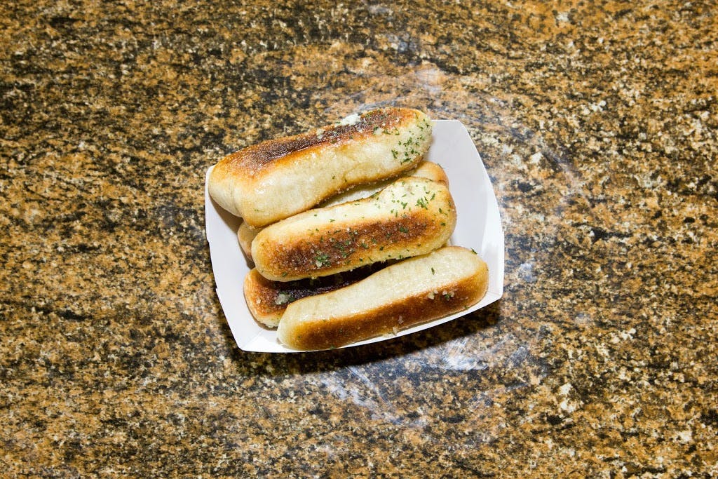 Order Breadsticks - Side food online from Nick's Pizza store, Baltimore on bringmethat.com