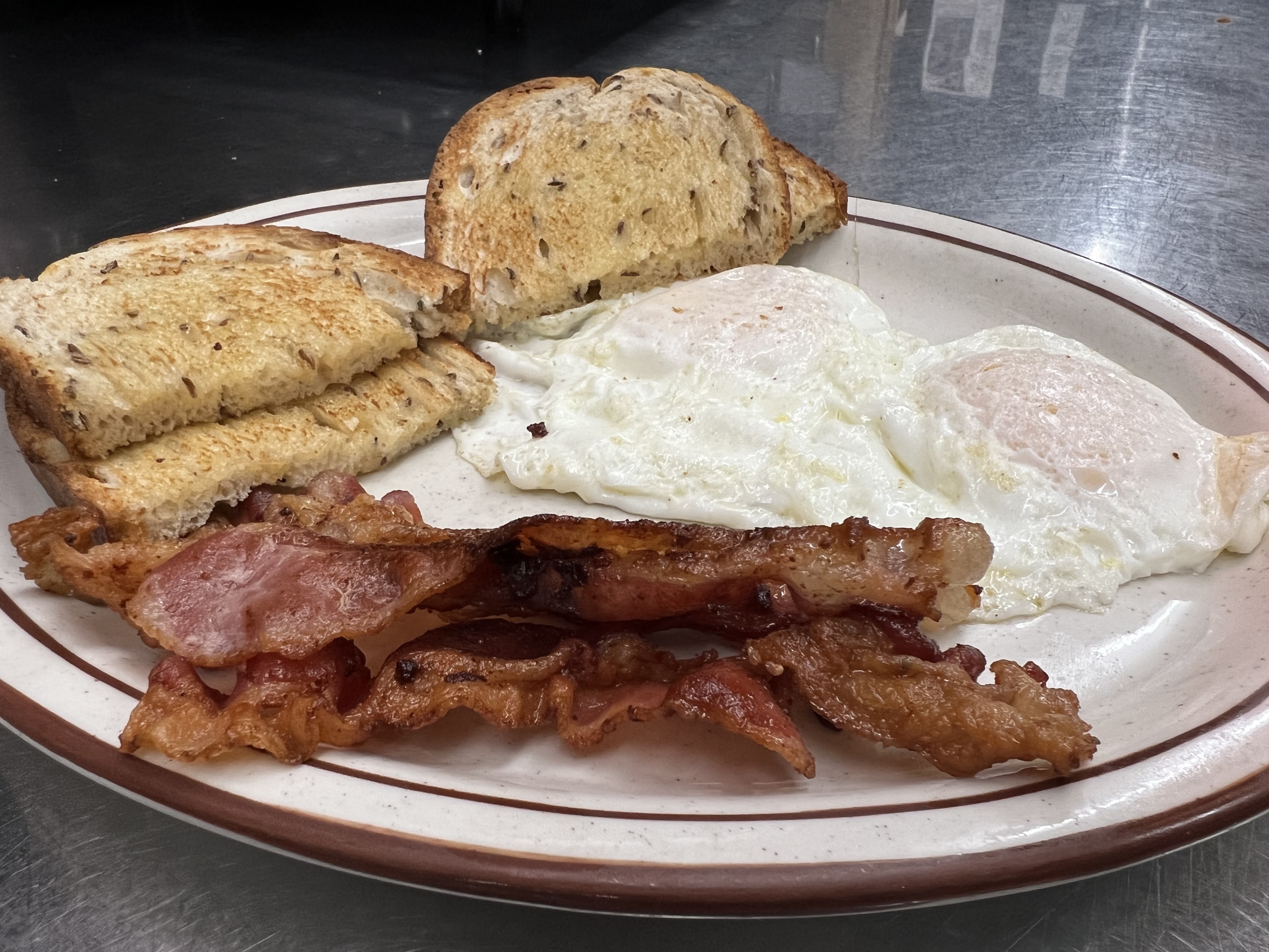 Order Two Eggs & Bacon food online from Eastridge Family Restaurant store, Rochester on bringmethat.com