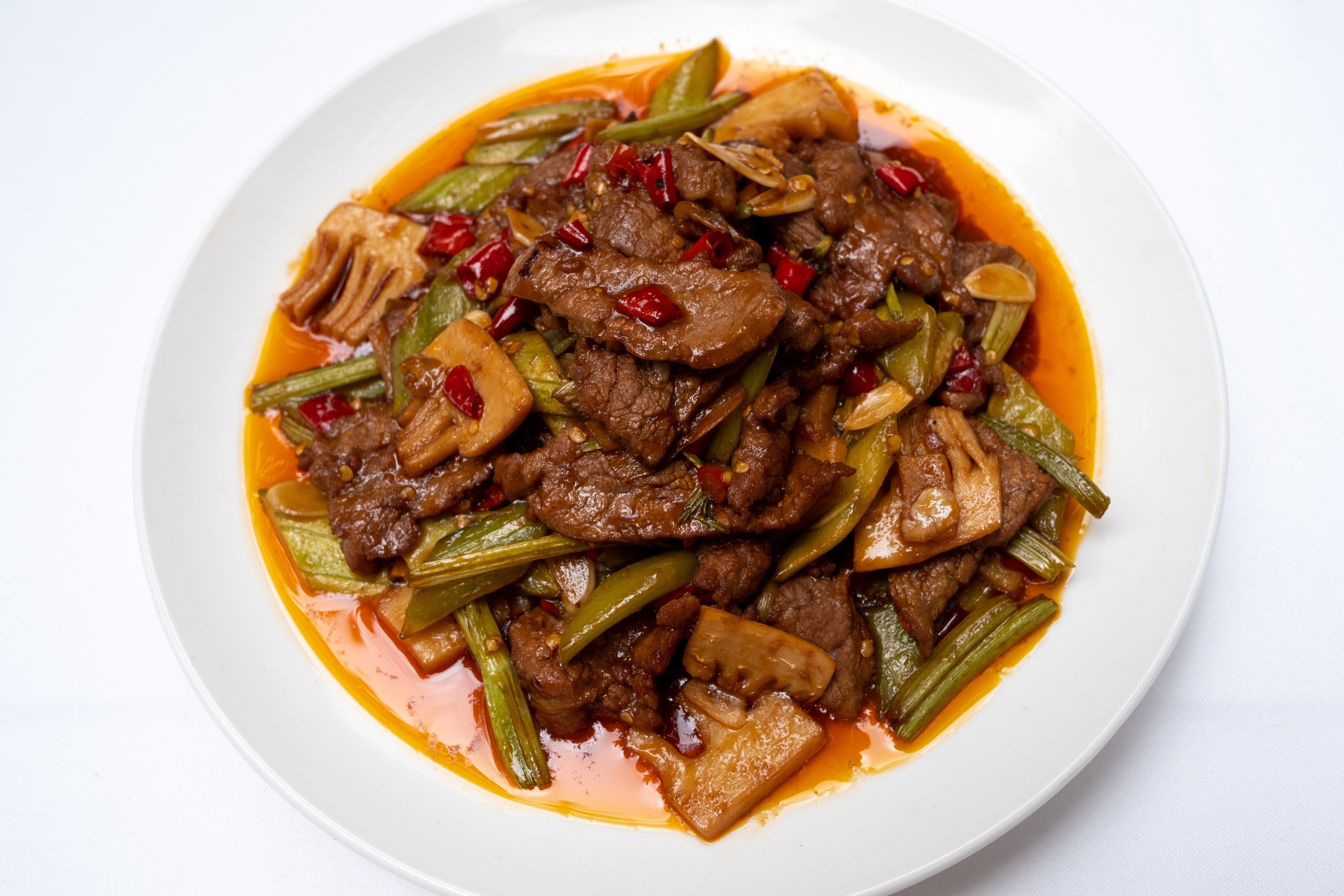 Order Beef w/ Wild Peppers 野生椒炒牛肉片 food online from Ollie's Sichuan store, New York on bringmethat.com