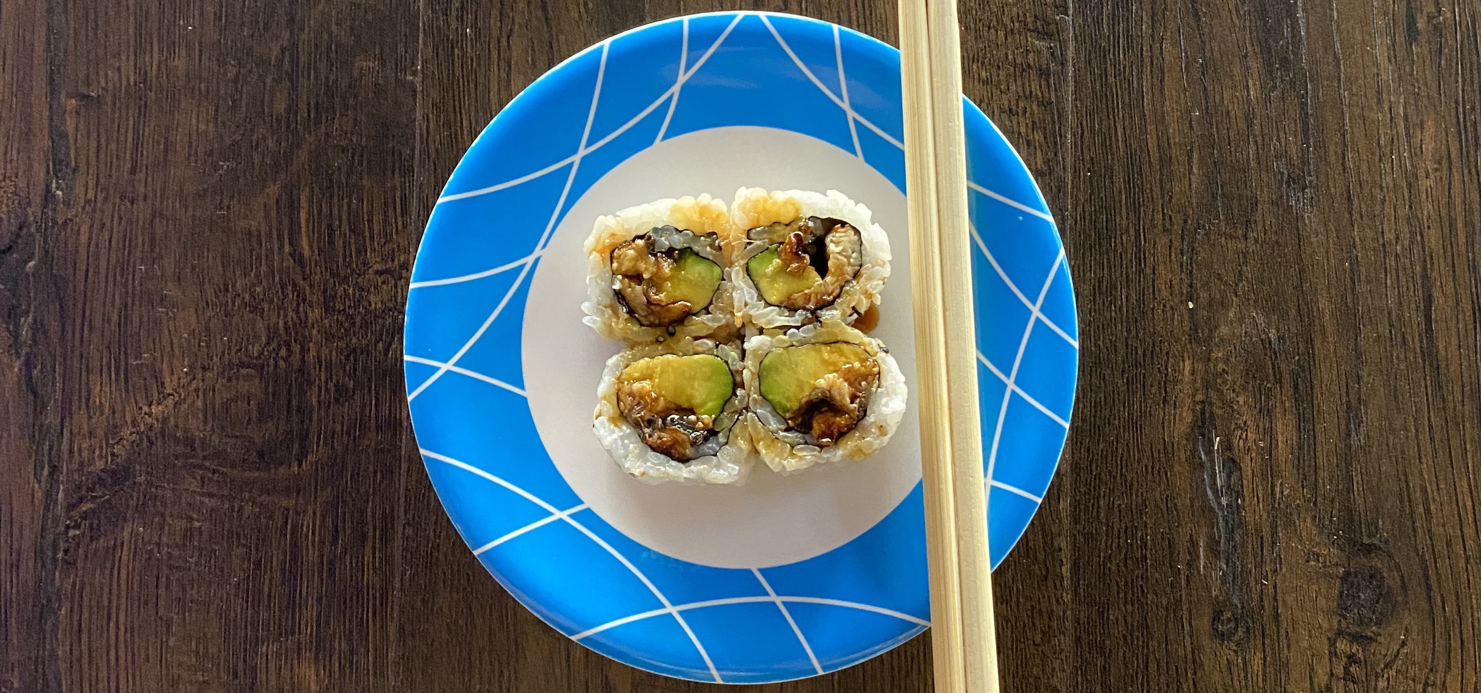 Order Eel Avocado Roll - 4 Pieces food online from Sushi Train store, Minneapolis on bringmethat.com