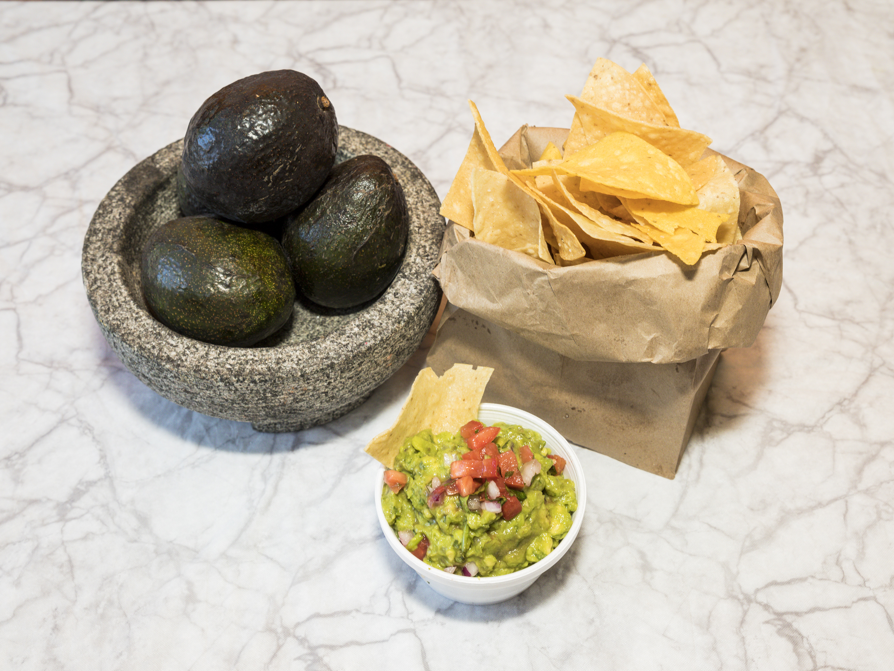 Order Guacamole Crudo food online from Tomatillo Taco Joint store, New Haven on bringmethat.com
