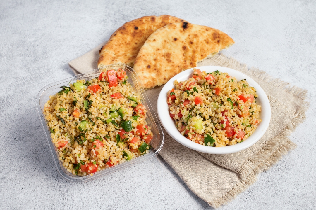 Order Traditional Tabouli | 8oz food online from Oren Hummus store, Cupertino on bringmethat.com