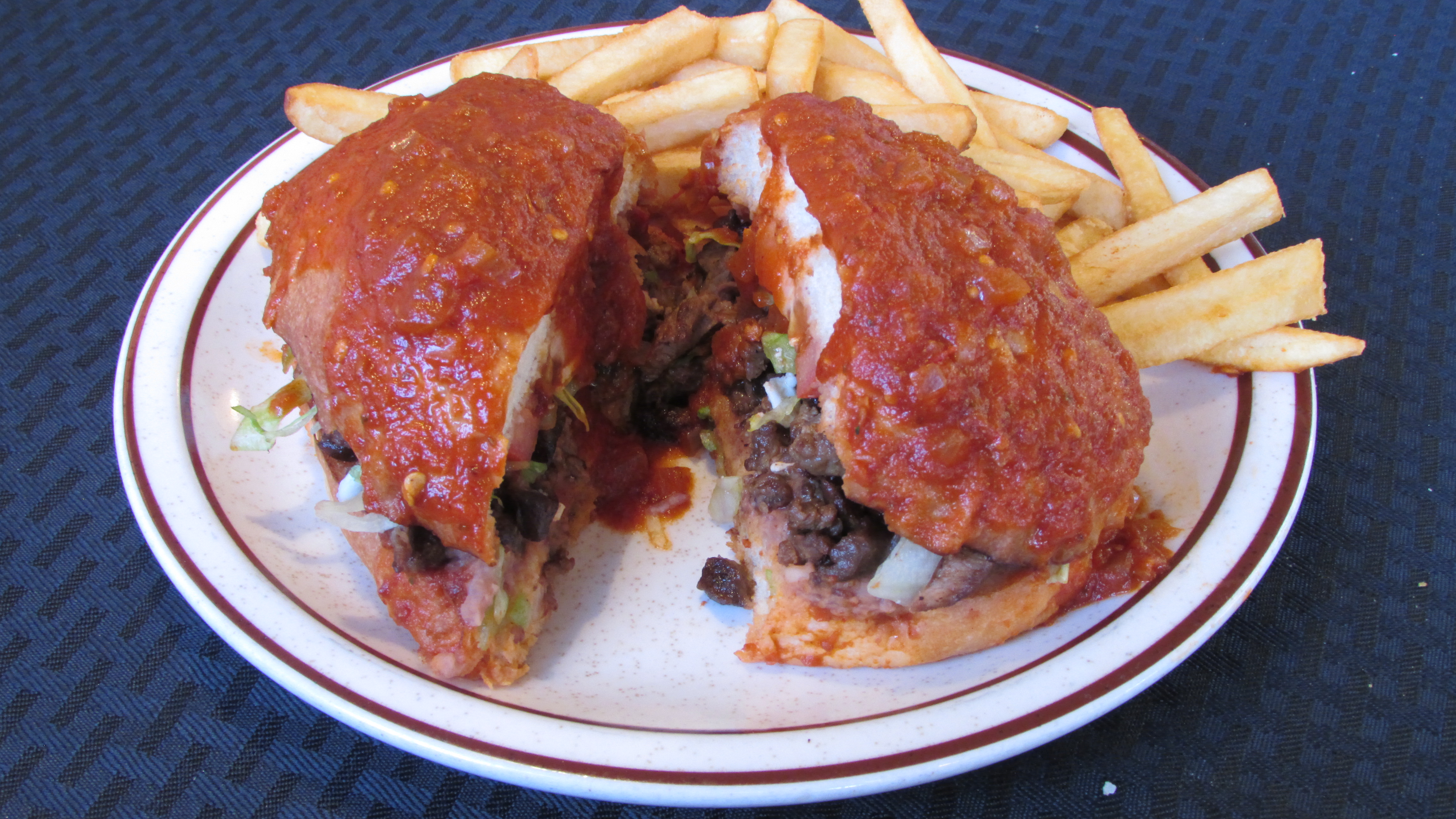 Order Spicy Torta Ahogada - Mexican Sandwich food online from Tortillas Restaurant store, Cathedral City on bringmethat.com