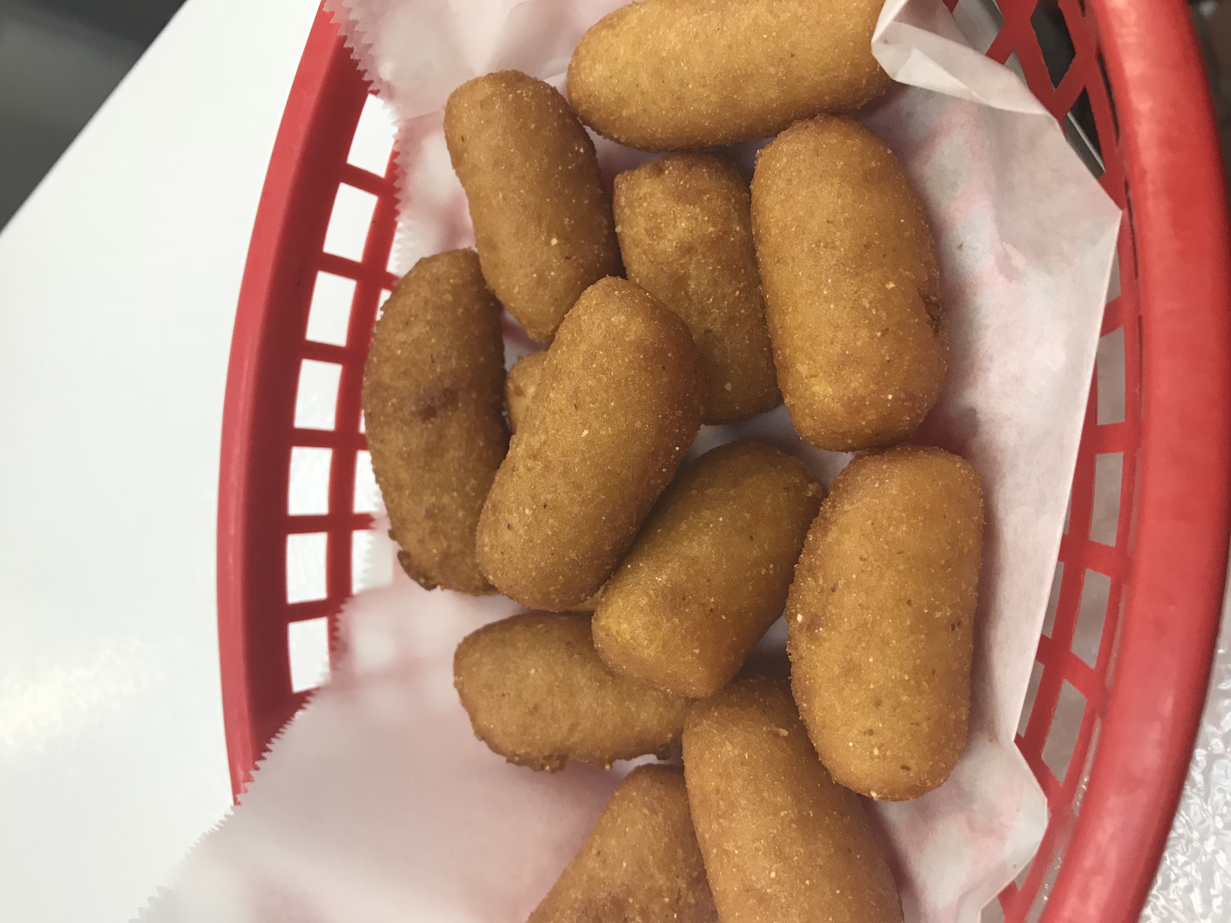 Order Hushpuppies food online from Tasty Crab store, Fayetteville on bringmethat.com