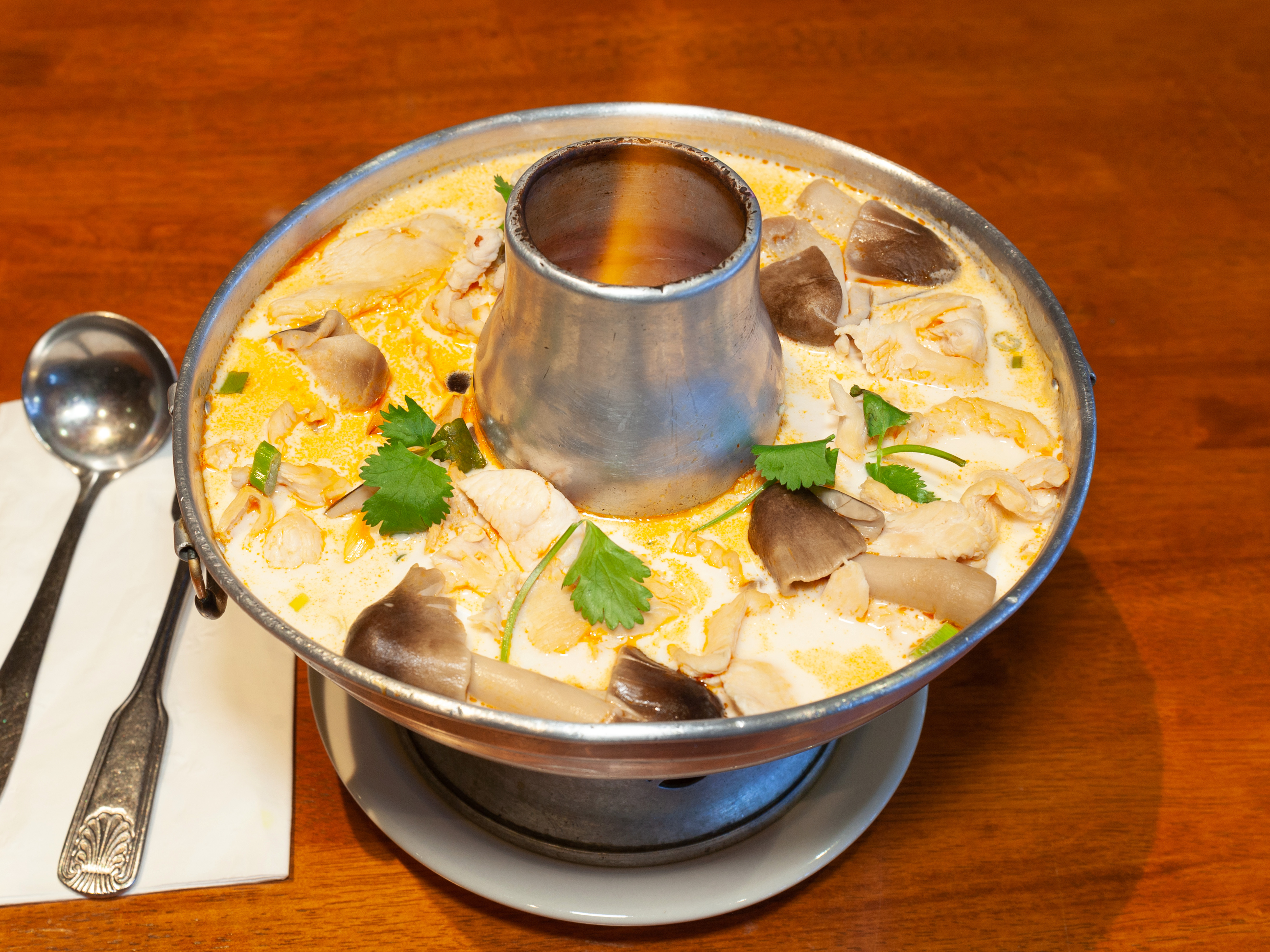Order Tom Ka Gai food online from Exotic Thai Cafe store, Woodland Hills on bringmethat.com