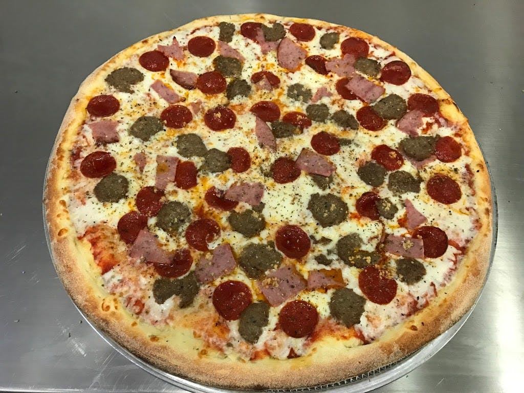 Order Meat Deluxe Pizza - 14'' (Feeds 2-3 People) food online from New York New York Giant Pizza store, Poway on bringmethat.com