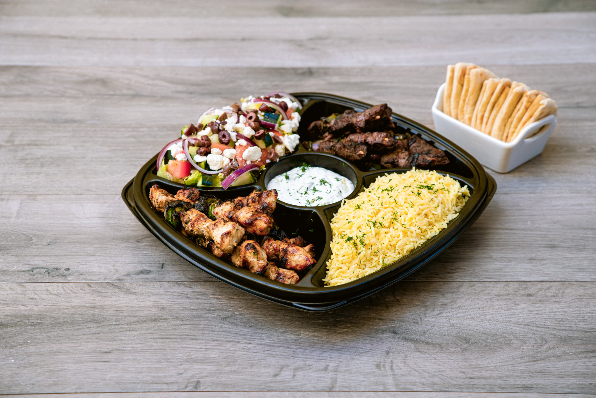 Order Mediterranean Family Feast food online from Daphne's Greek Cafe store, Thousand Oaks on bringmethat.com