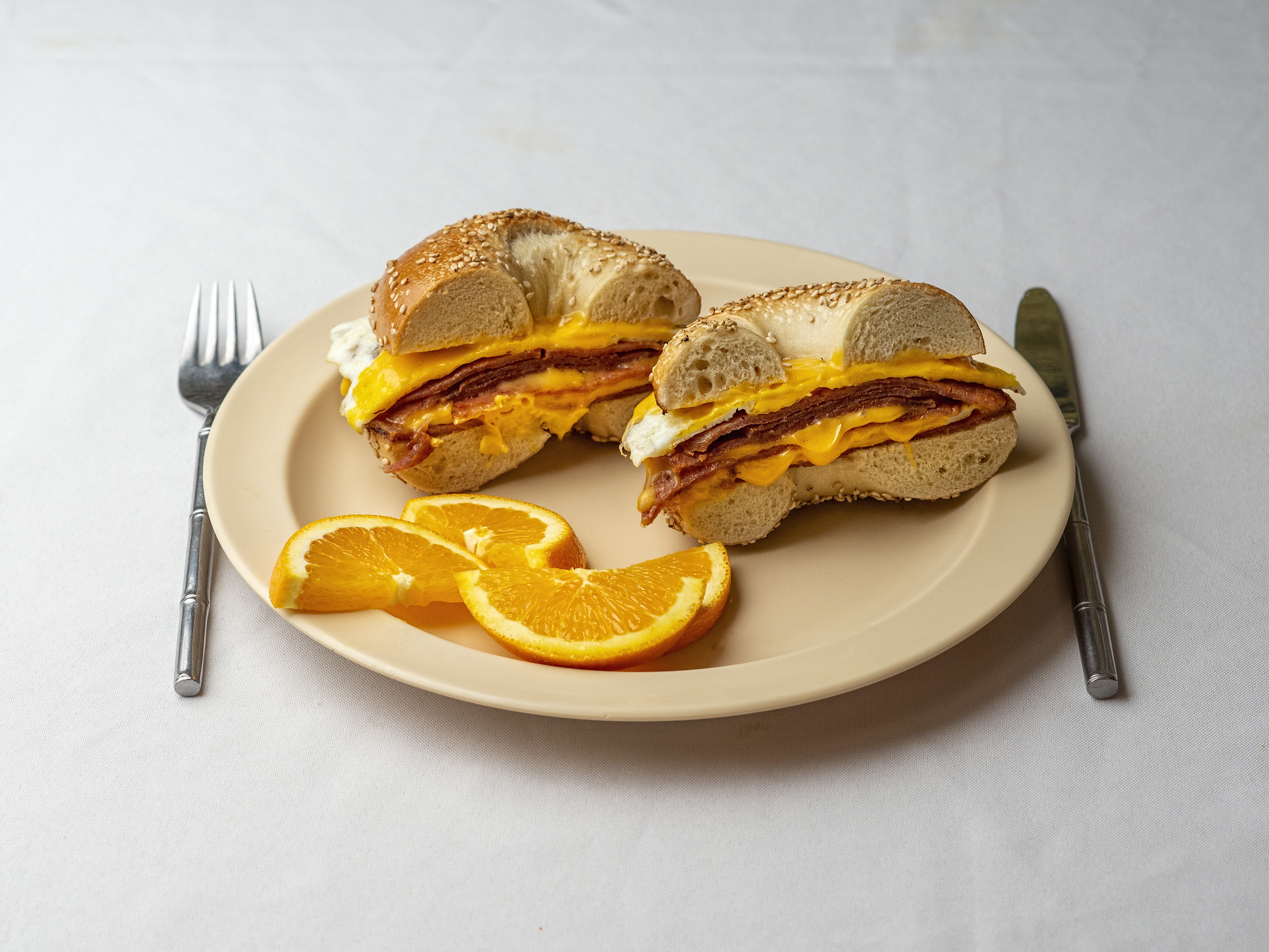 Order Egg, Meat and Cheese on a Bagel Sandwich food online from The Bagel Club store, Flemington on bringmethat.com