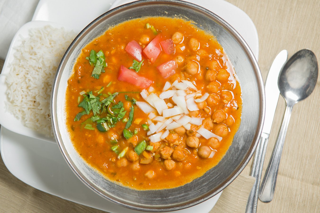 Order Chole Peshawari food online from Udupi Indian Vegetarian & Vegan Cuisine store, Tempe on bringmethat.com