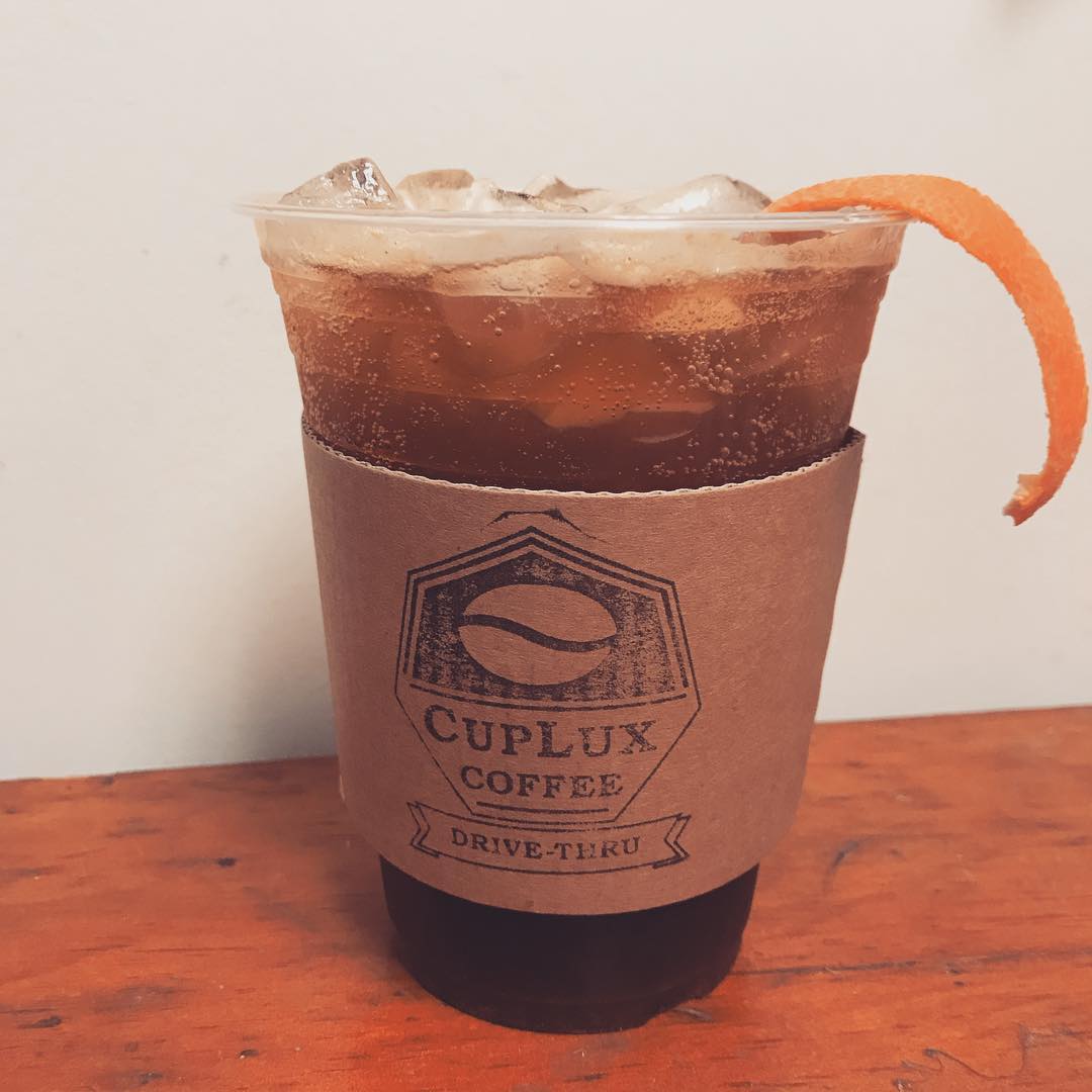 Order 16 oz. Iced Americano food online from CupLux Coffee Drive-Thru store, Charlotte on bringmethat.com