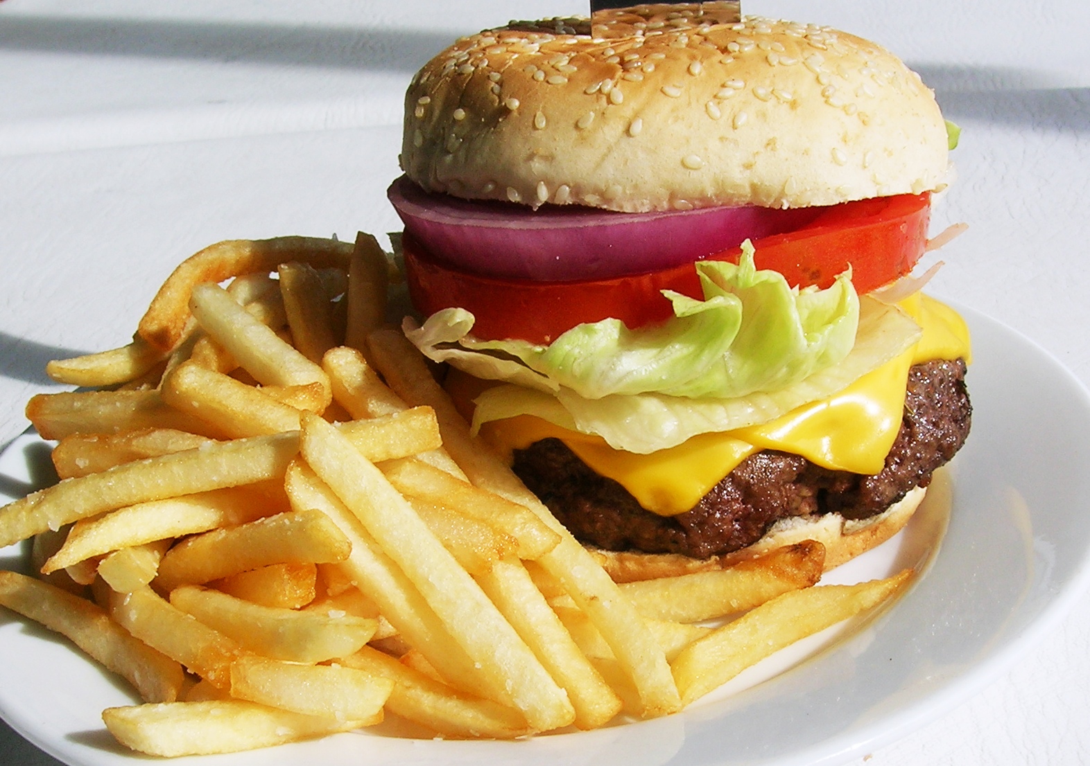 Order  Cheese Burger 1/3 pound meat & Fries Meal food online from SF Pizza store, San Francisco on bringmethat.com