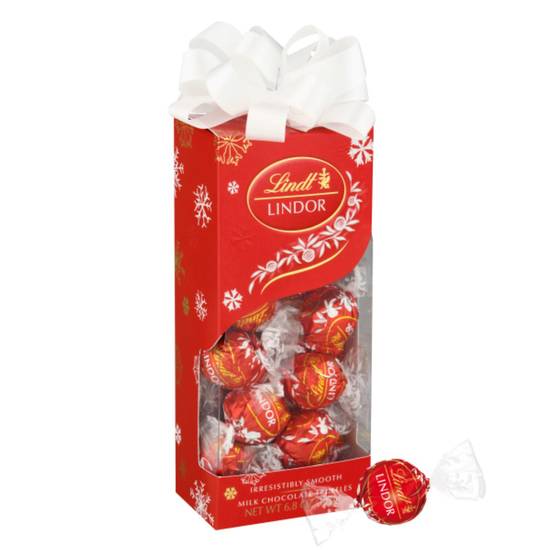 Order Lindt LINDOR Milk Chocolate Candy Truffles Traditions Gift Box, 6.8 oz. food online from CVS store, WILLIAMSBURG on bringmethat.com