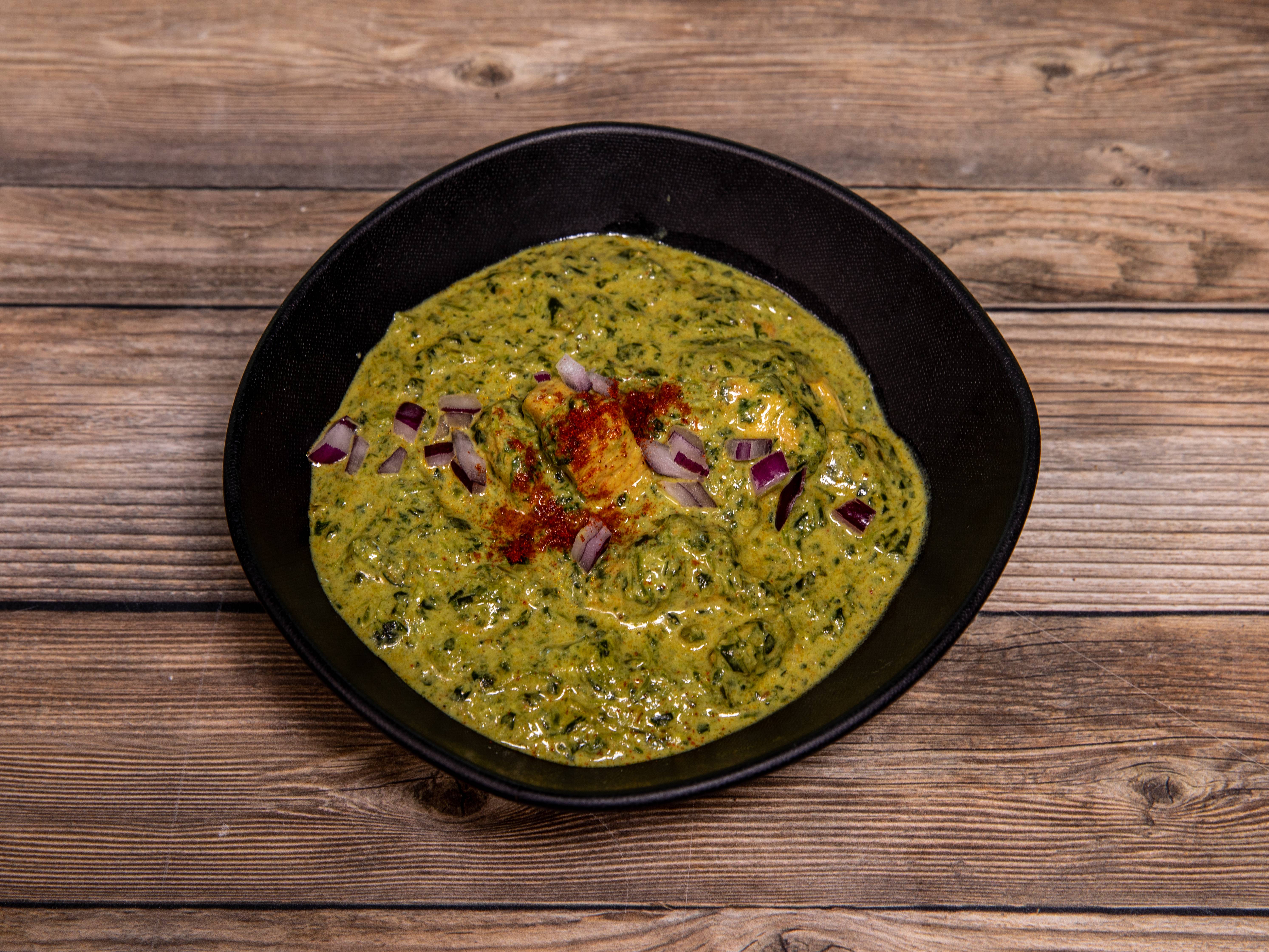 Order Spinach Chicken food online from Madras Dhaba store, Austin on bringmethat.com