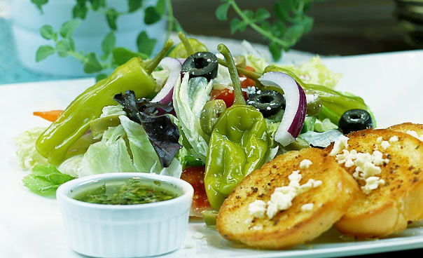 Order Greek Salad food online from Sicily Pizza & Pasta store, Houston on bringmethat.com