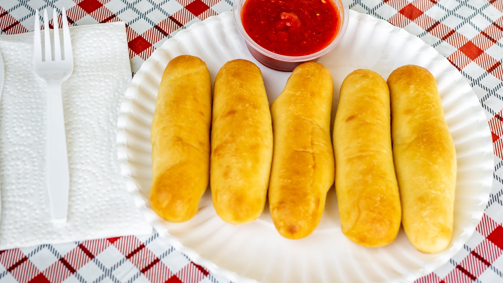 Order Garlic Breadsticks - 5 Pieces food online from Palermo Pizza & Subs store, Hannibal on bringmethat.com