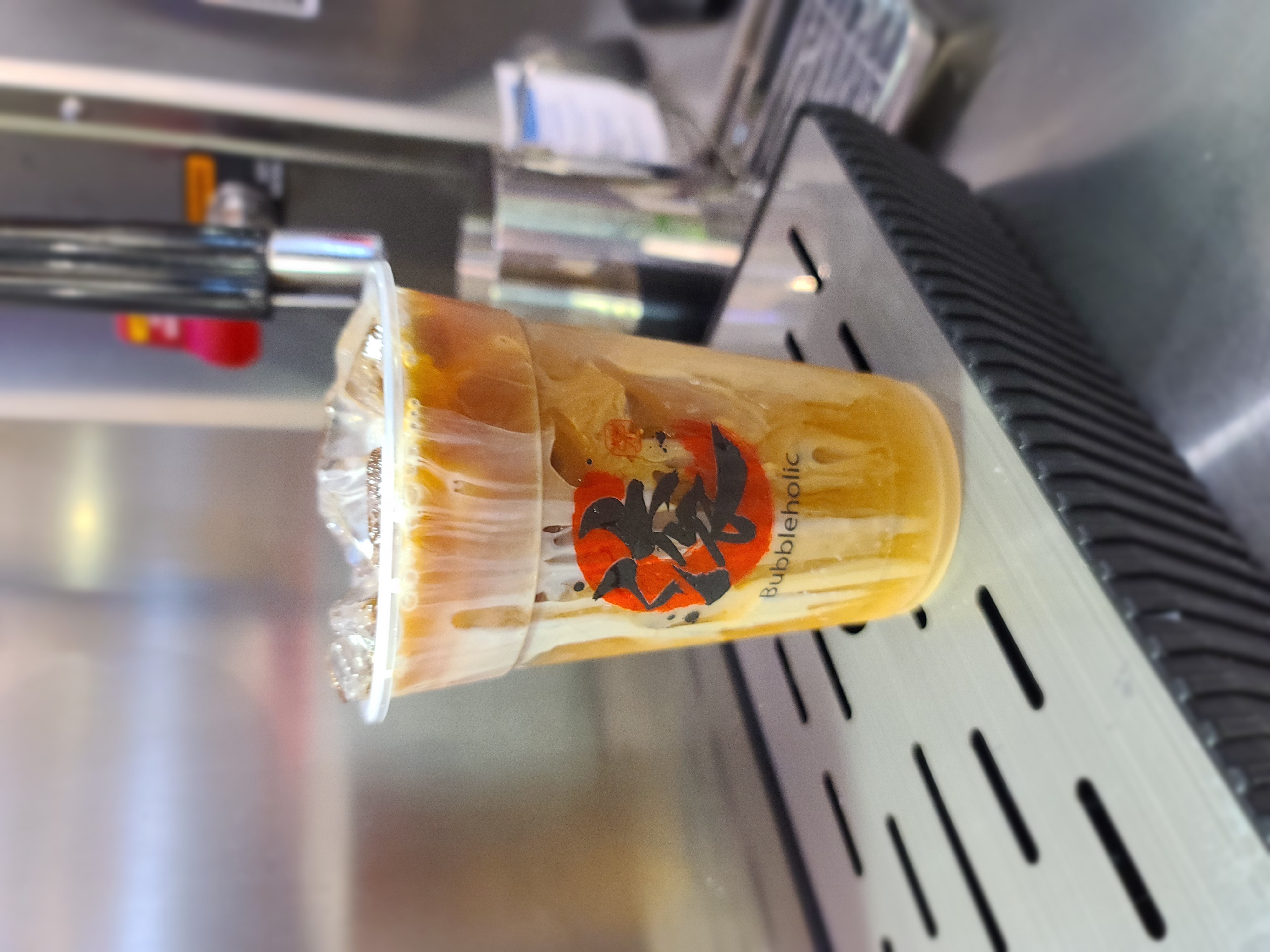 Order Iced Black Coffee with Milk food online from Bubbleholic Bubble Tea store, Trumbull on bringmethat.com