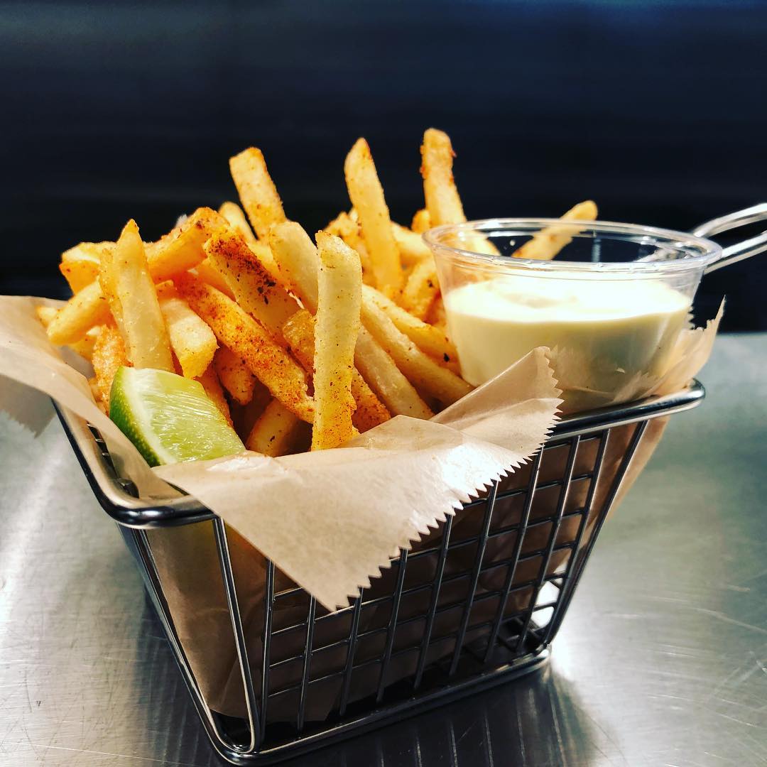 Order Harissa Fries food online from Executive Order Bar & Lounge store, San Francisco on bringmethat.com