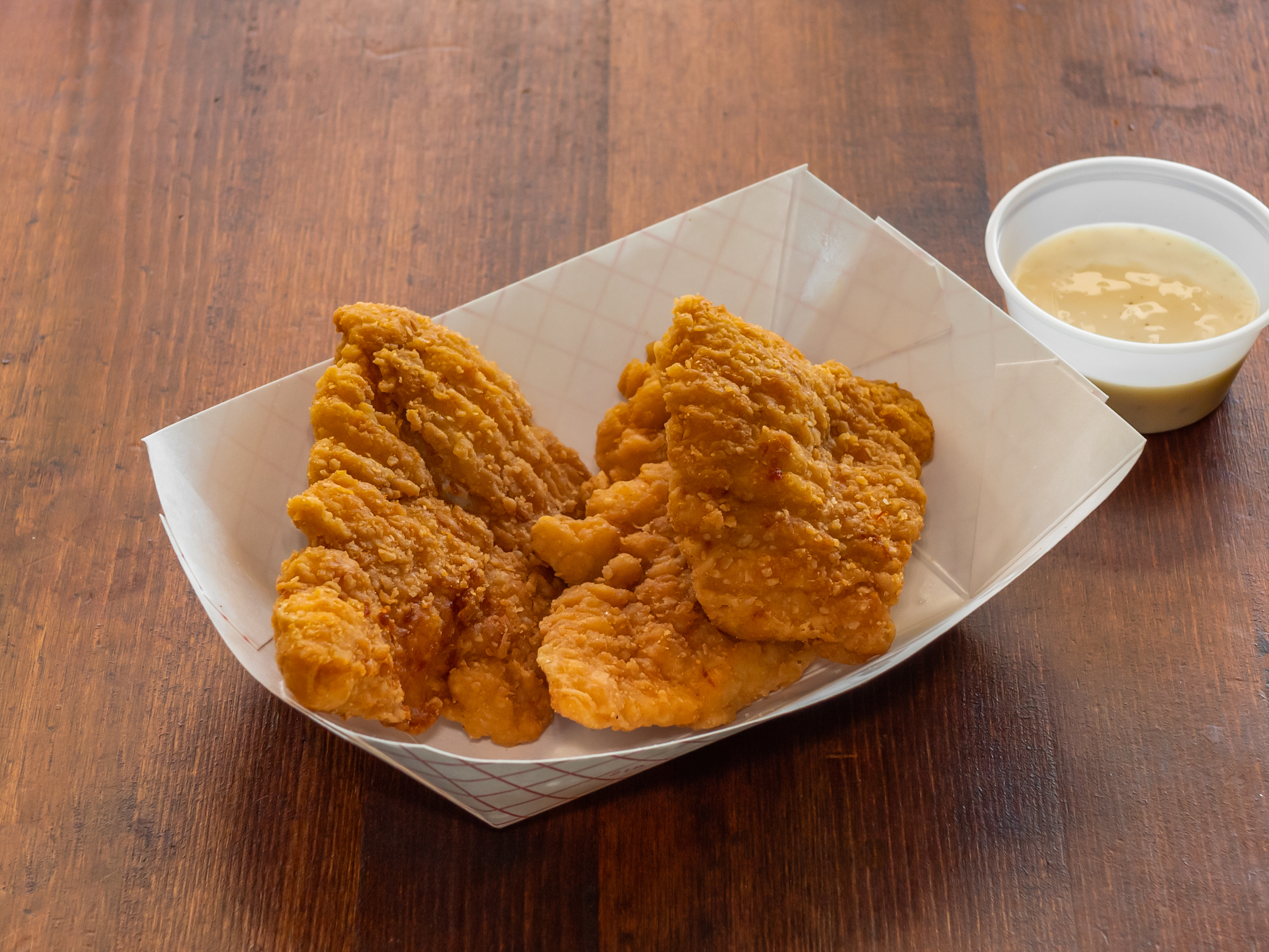 Order Chicken Strips food online from Taste of the Islands store, Plano on bringmethat.com
