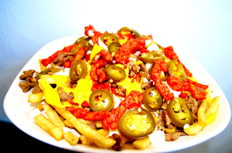 Order Flaming Hot Cheetos Fries food online from D'Leon's Mexican Food store, Lincoln on bringmethat.com