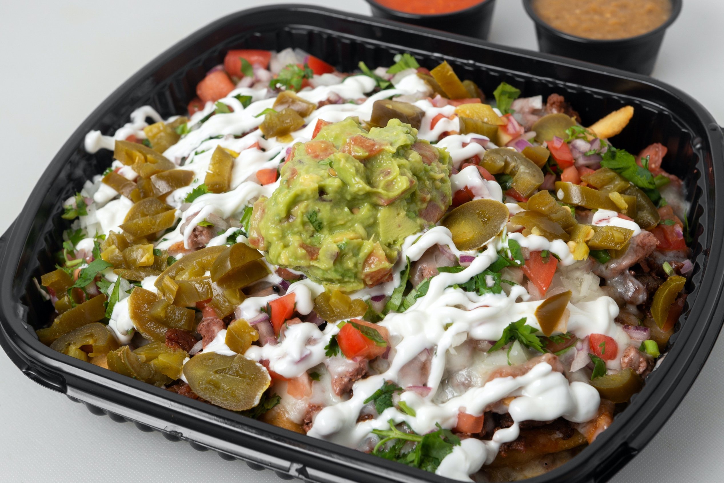Order Supreme Nachos food online from Tacos Panchito store, Corona on bringmethat.com