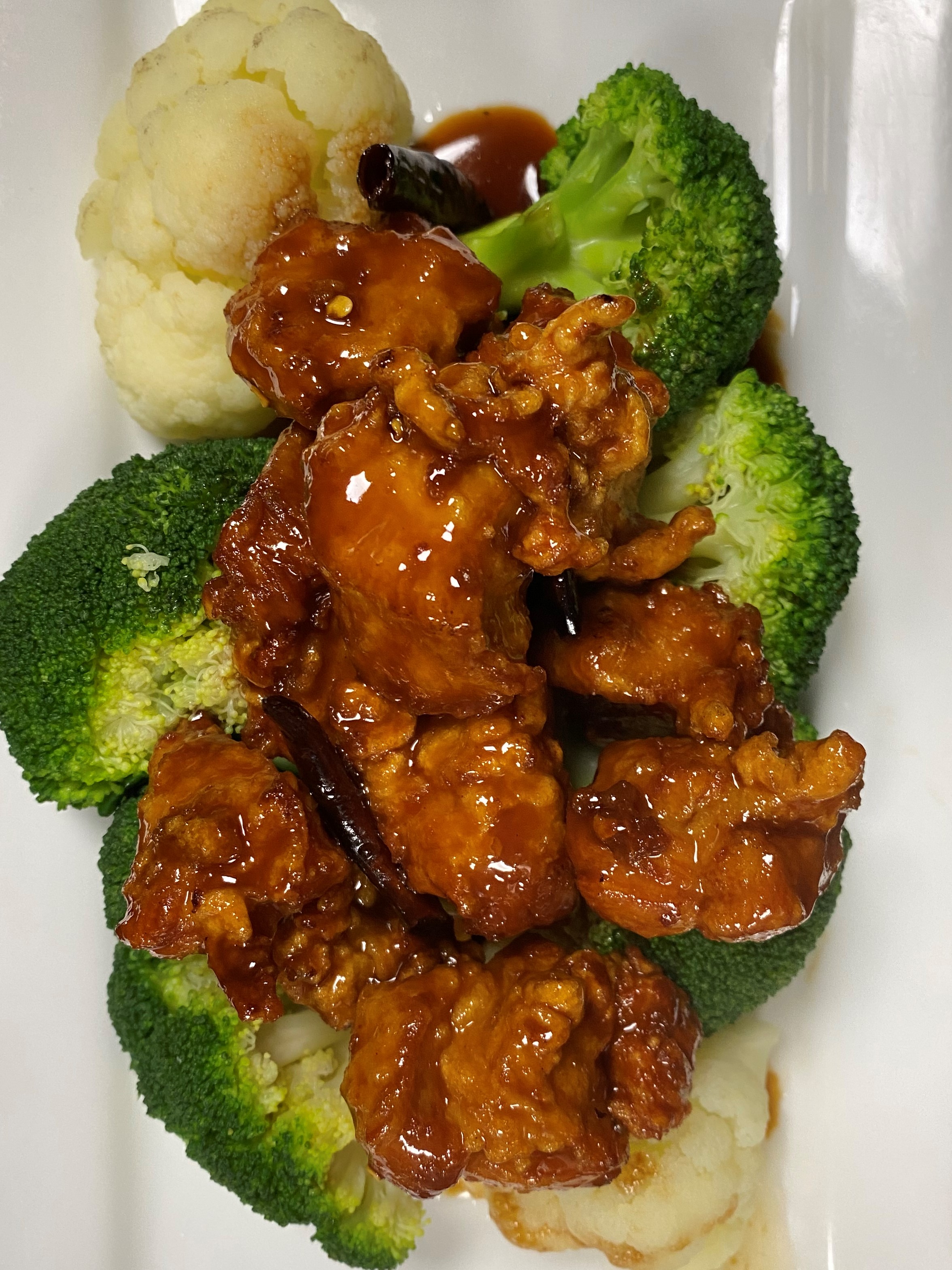 Order General Tso's Chicken food online from Blossom Root Asian Cuisine store, New City on bringmethat.com