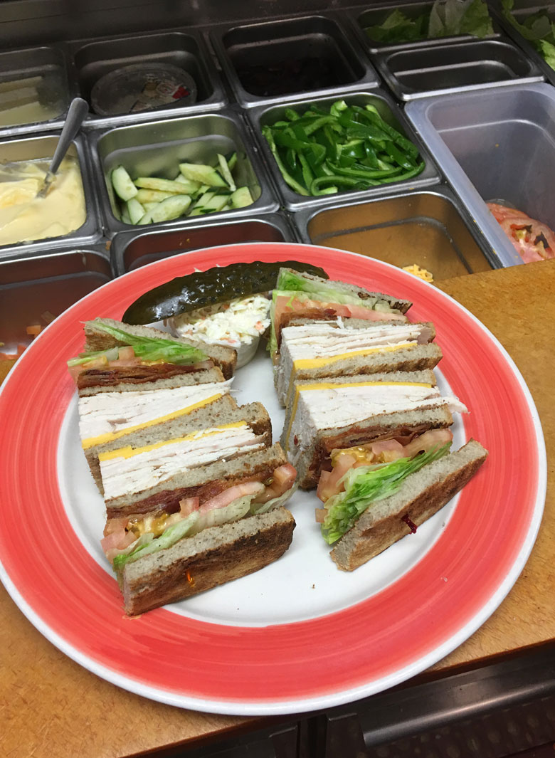 Order Turkey Club Sandwich food online from Red Hut Diner store, Rockaway on bringmethat.com