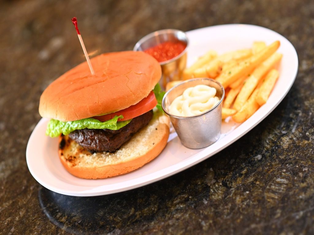 Order Jerk Burger food online from Cafe 214 store, Addison on bringmethat.com