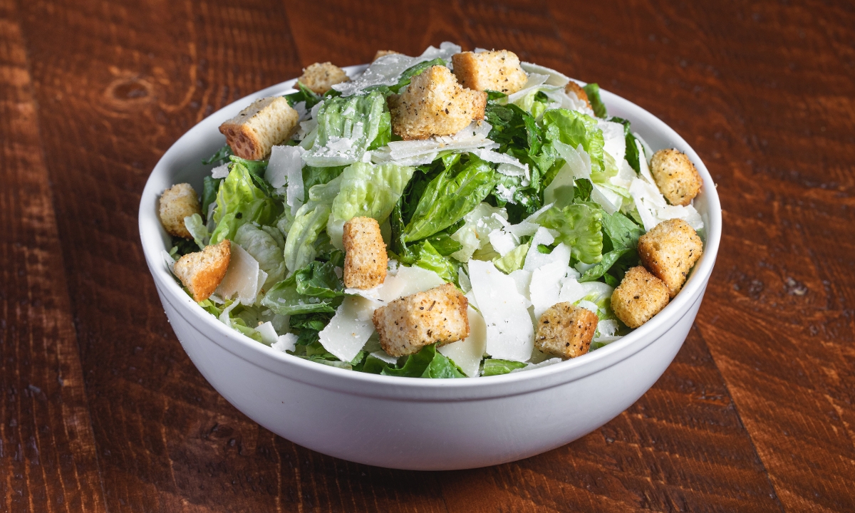 Order Traditional Caesar Salad food online from Buckhorn Grill store, Vacaville on bringmethat.com