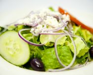 Order Greek Salad food online from Basil Leaf Cafe store, Chicago on bringmethat.com