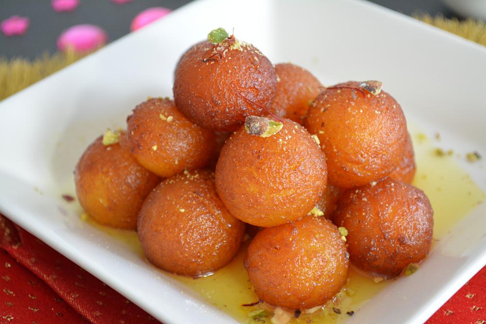 Order Gulab Jamun (4 Pieces) food online from Biryani Pointe store, Lombard on bringmethat.com