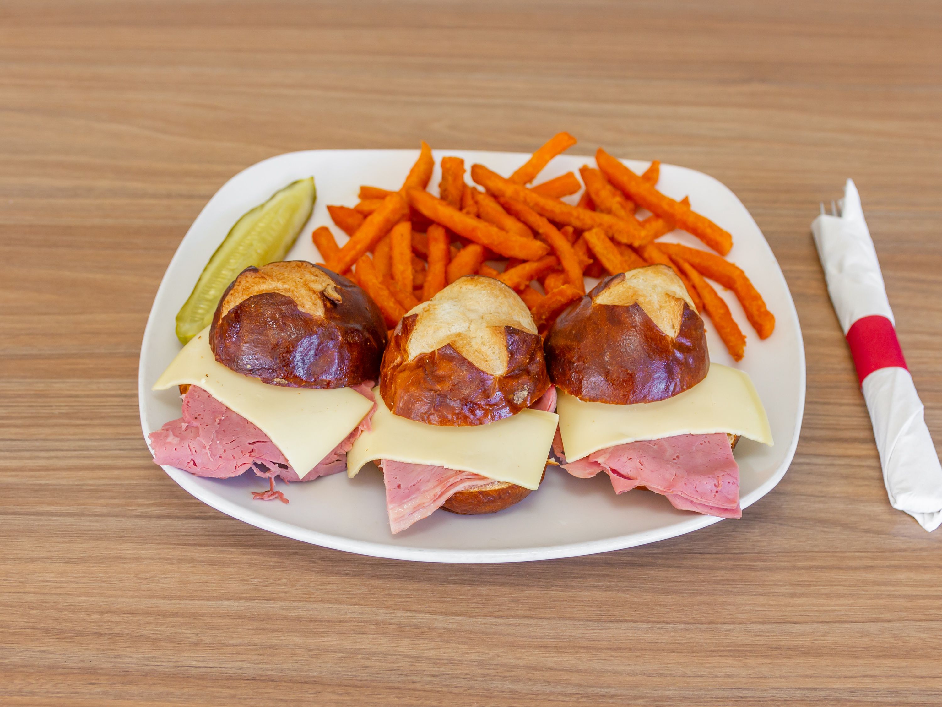 Order Corned Beef and Swiss Sliders  food online from Village Gourmet Hot Dogs store, Westland on bringmethat.com