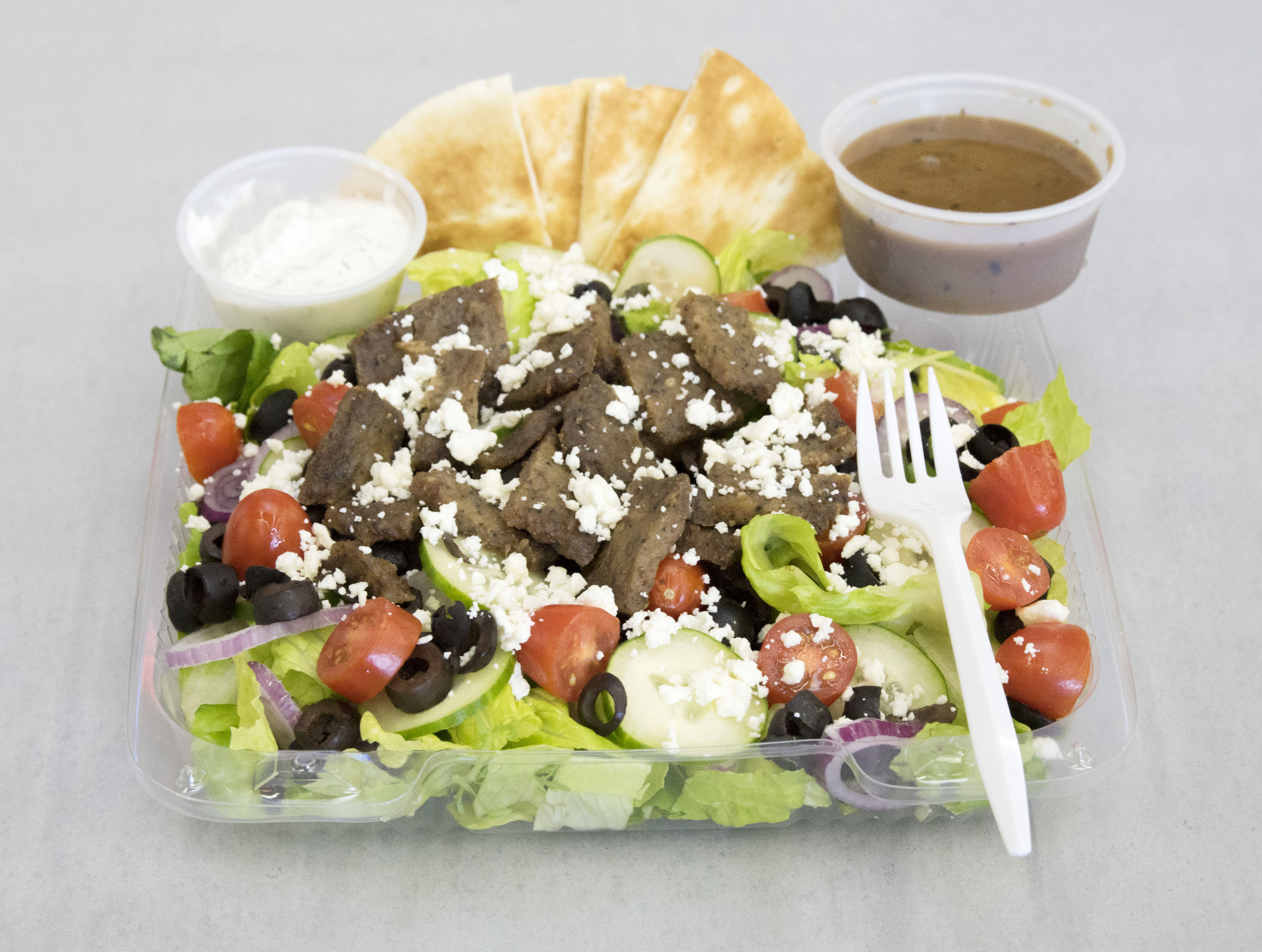Order Greek Salad food online from Knockout Deli store, San Diego on bringmethat.com