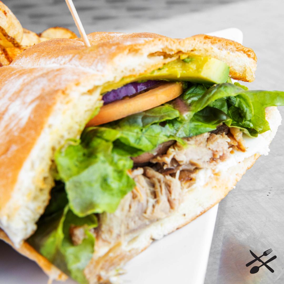 Order Carnitas Torta food online from Spanglish Kitchen store, Alhambra on bringmethat.com
