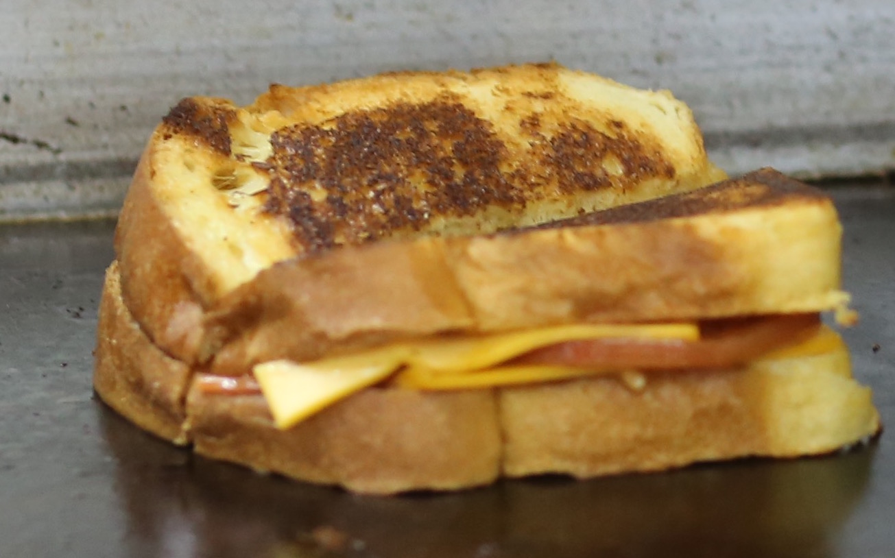 Order Grilled Cheese Sandwich with Tomato food online from The Burger Joint store, New York on bringmethat.com