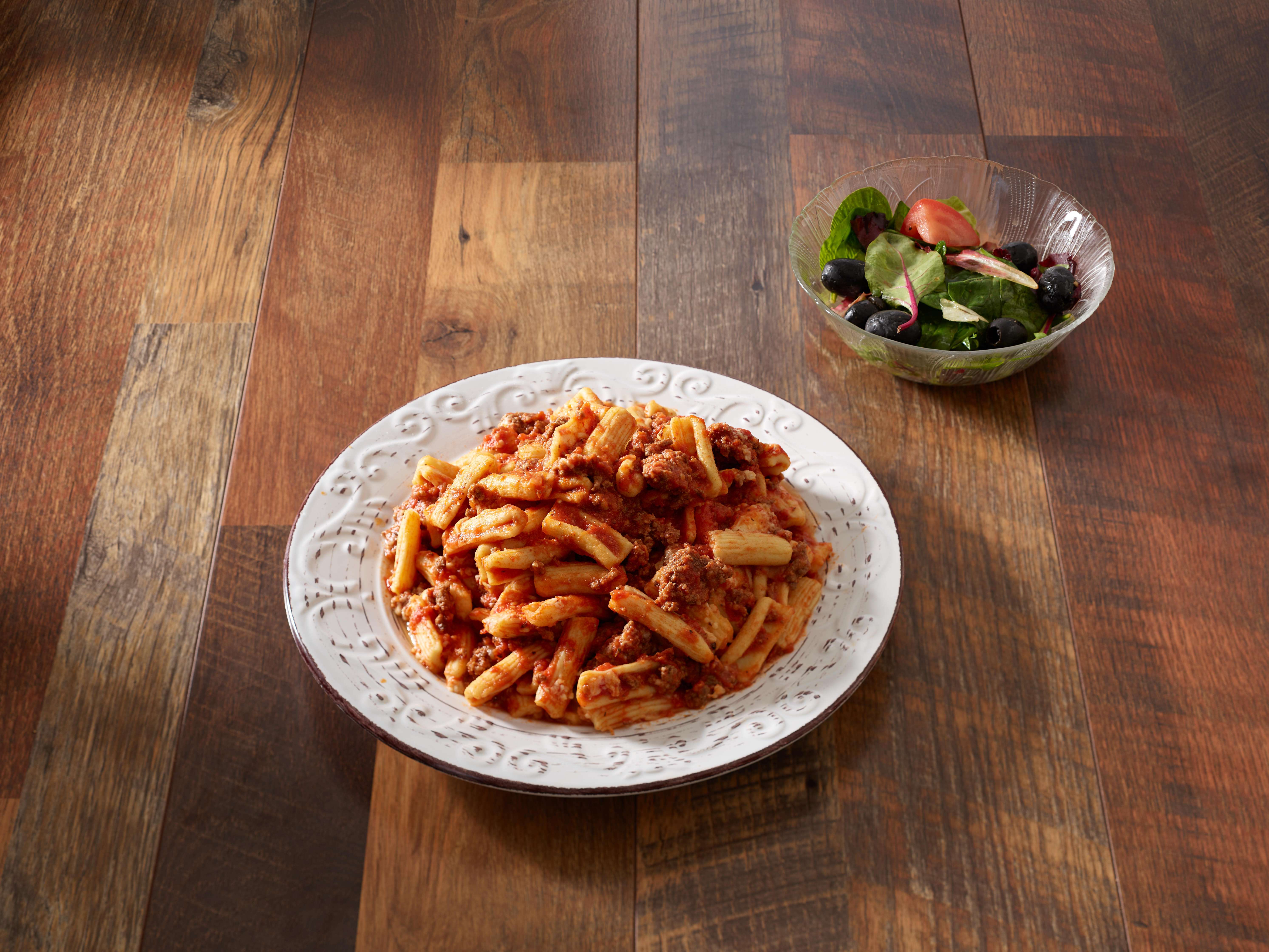 Order Cavatelli with Meatsauce  food online from Pompeo's Restaurant & Catering store, Branford on bringmethat.com