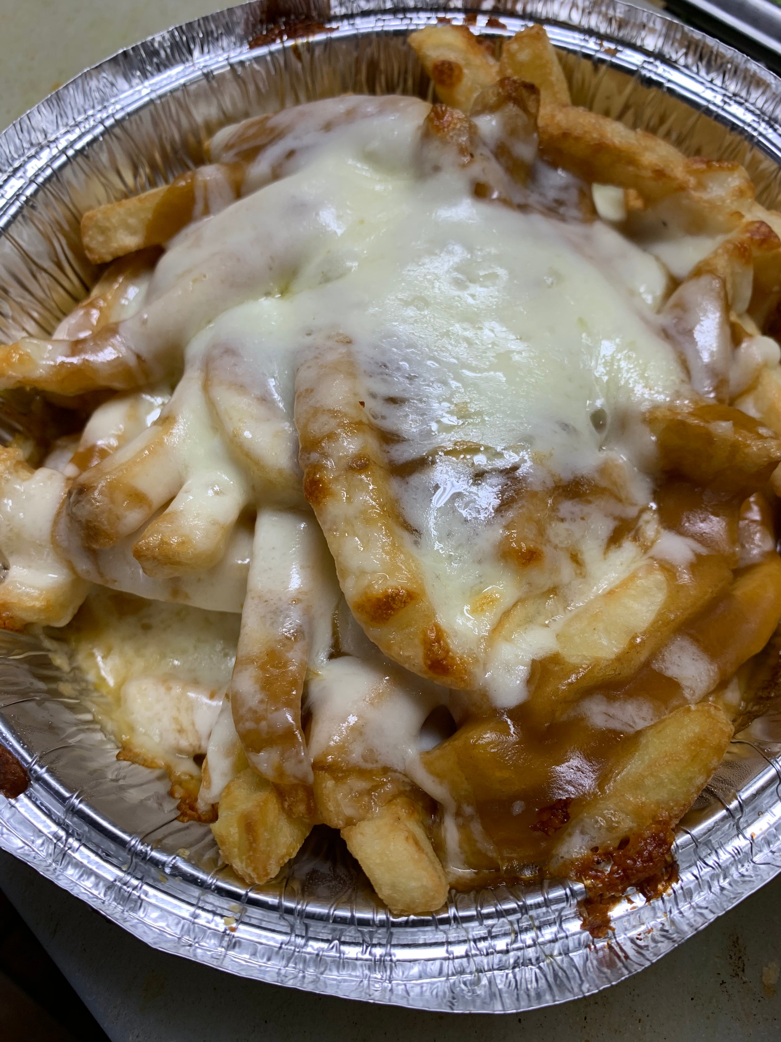 Order Disco Fries - Side food online from Giovannelie Restaurant store, New Brunswick on bringmethat.com