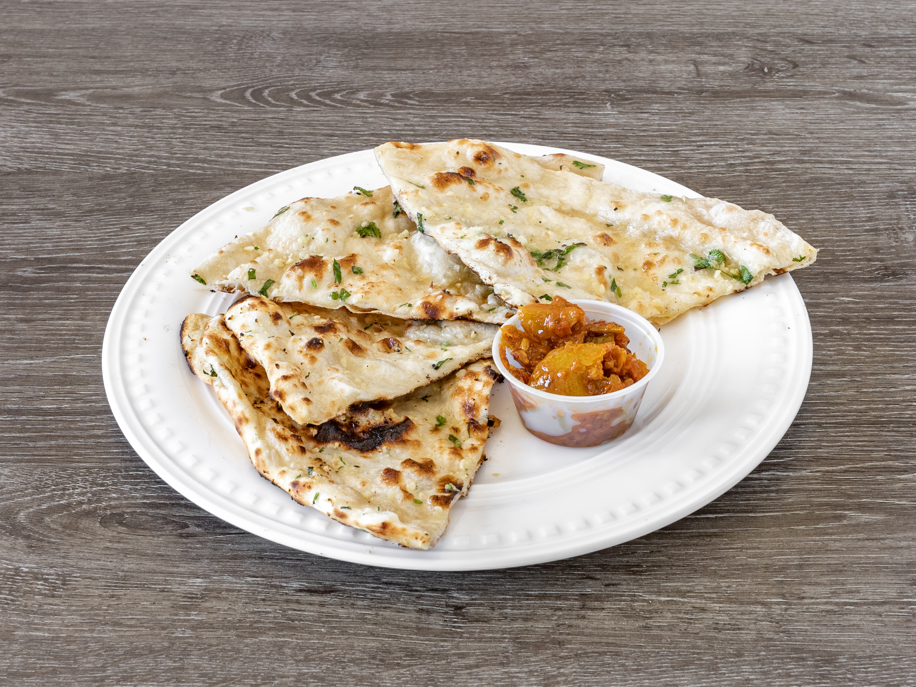 Order Garlic Naan food online from Fresh Curry Chefs store, Camarillo on bringmethat.com