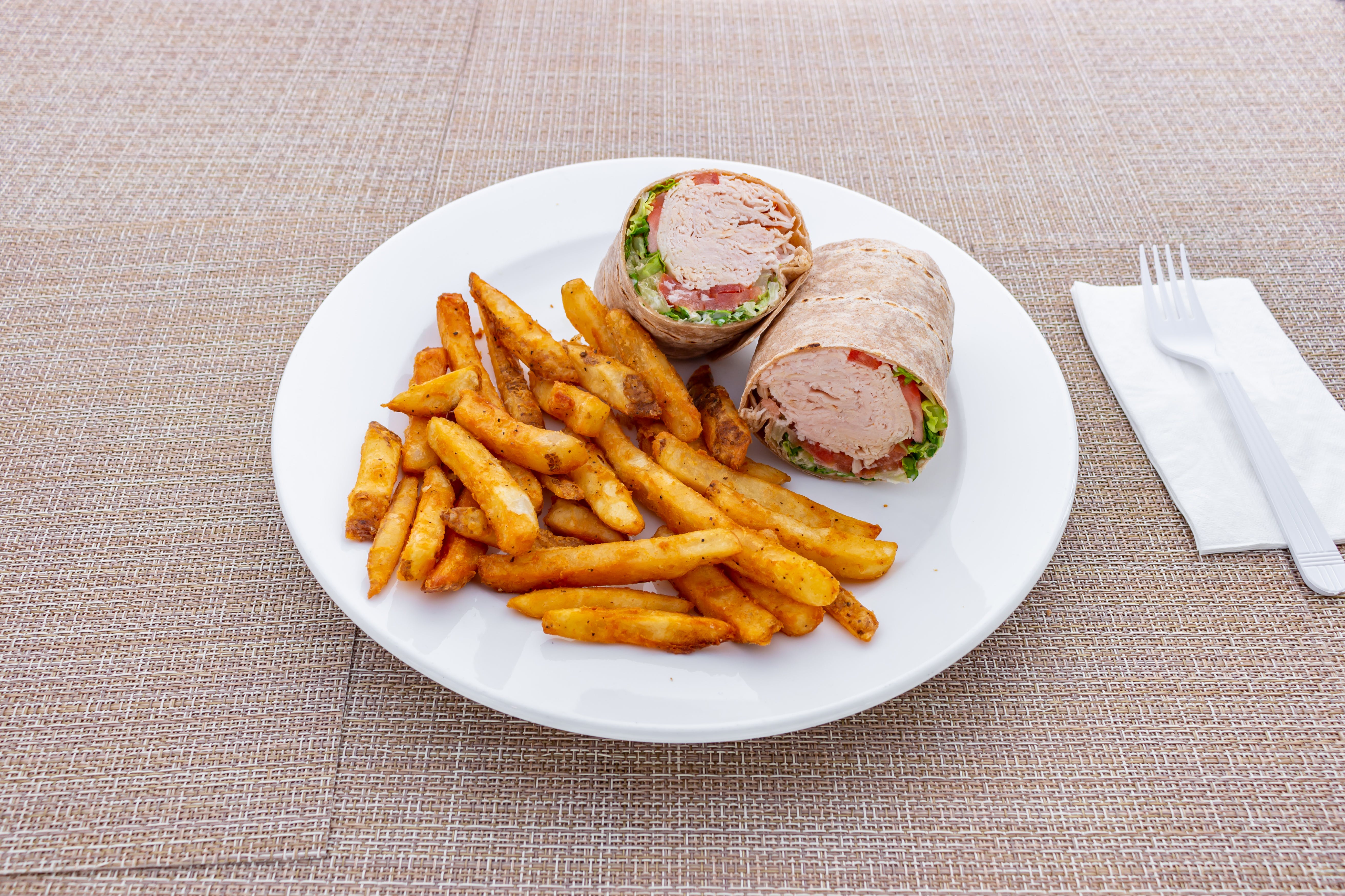 Order Turkey Wrap - Wrap food online from Ralphy's Pizza And Restaurant store, Paramus on bringmethat.com