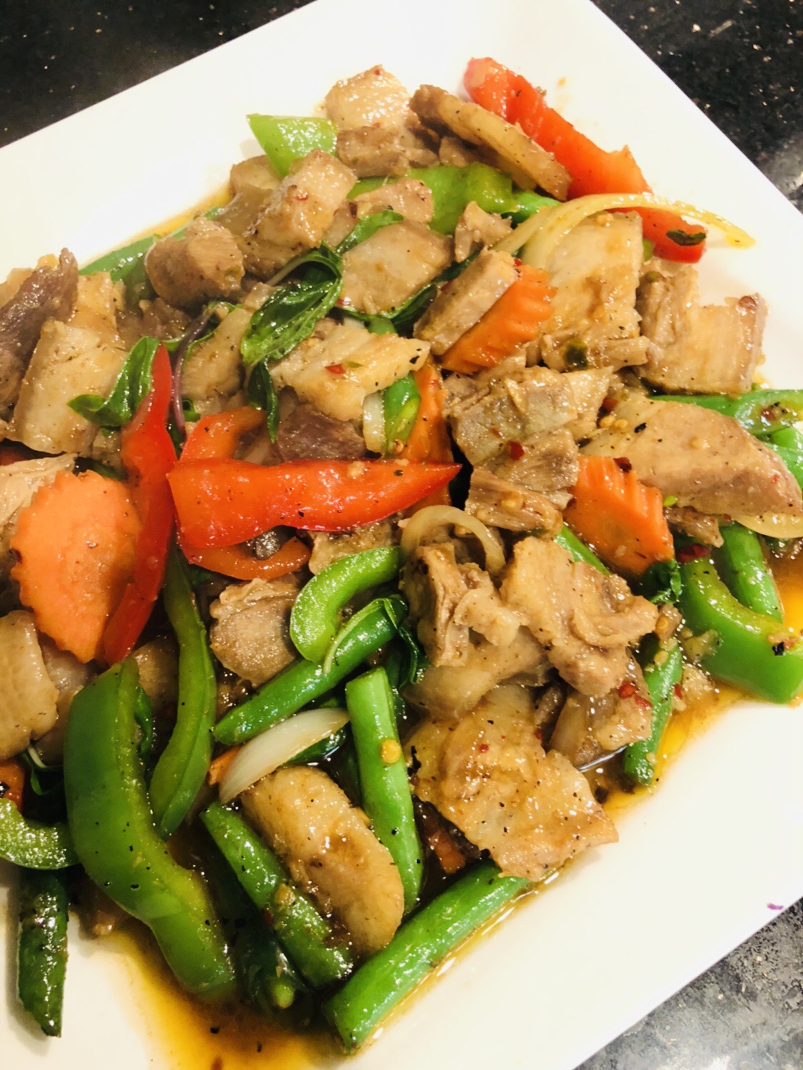 Order Spicy Pork Belly food online from Exotic Thai Cafe store, Woodland Hills on bringmethat.com