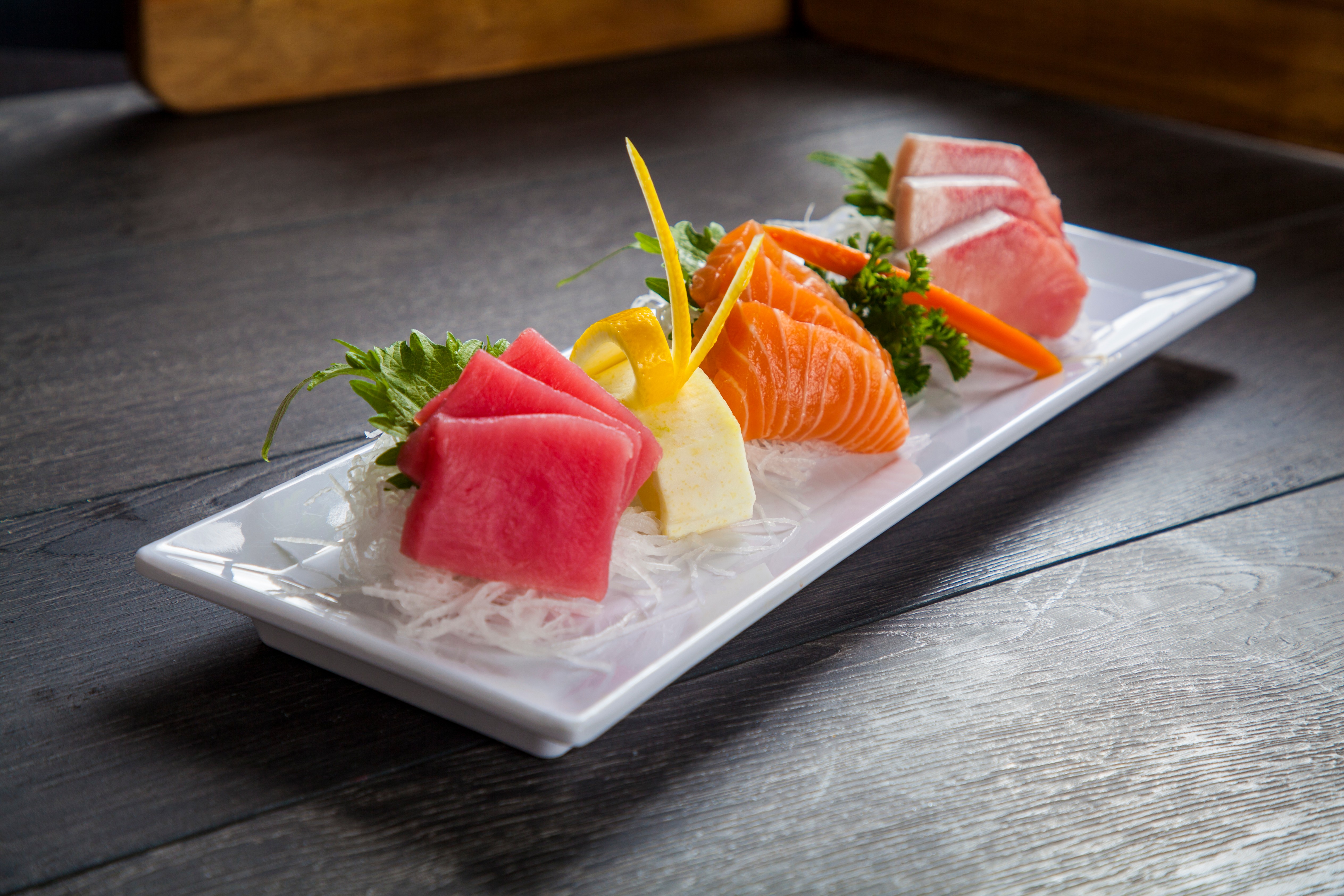 Order 12 Pieces Sashimi food online from Ozen Sushi store, Norwalk on bringmethat.com