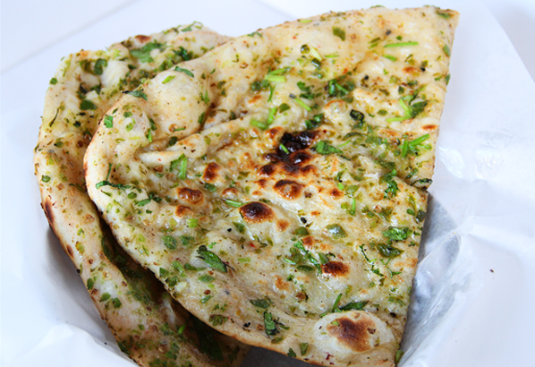 Order Bullet Naan food online from Saffron Indian Bistro store, Tucson on bringmethat.com