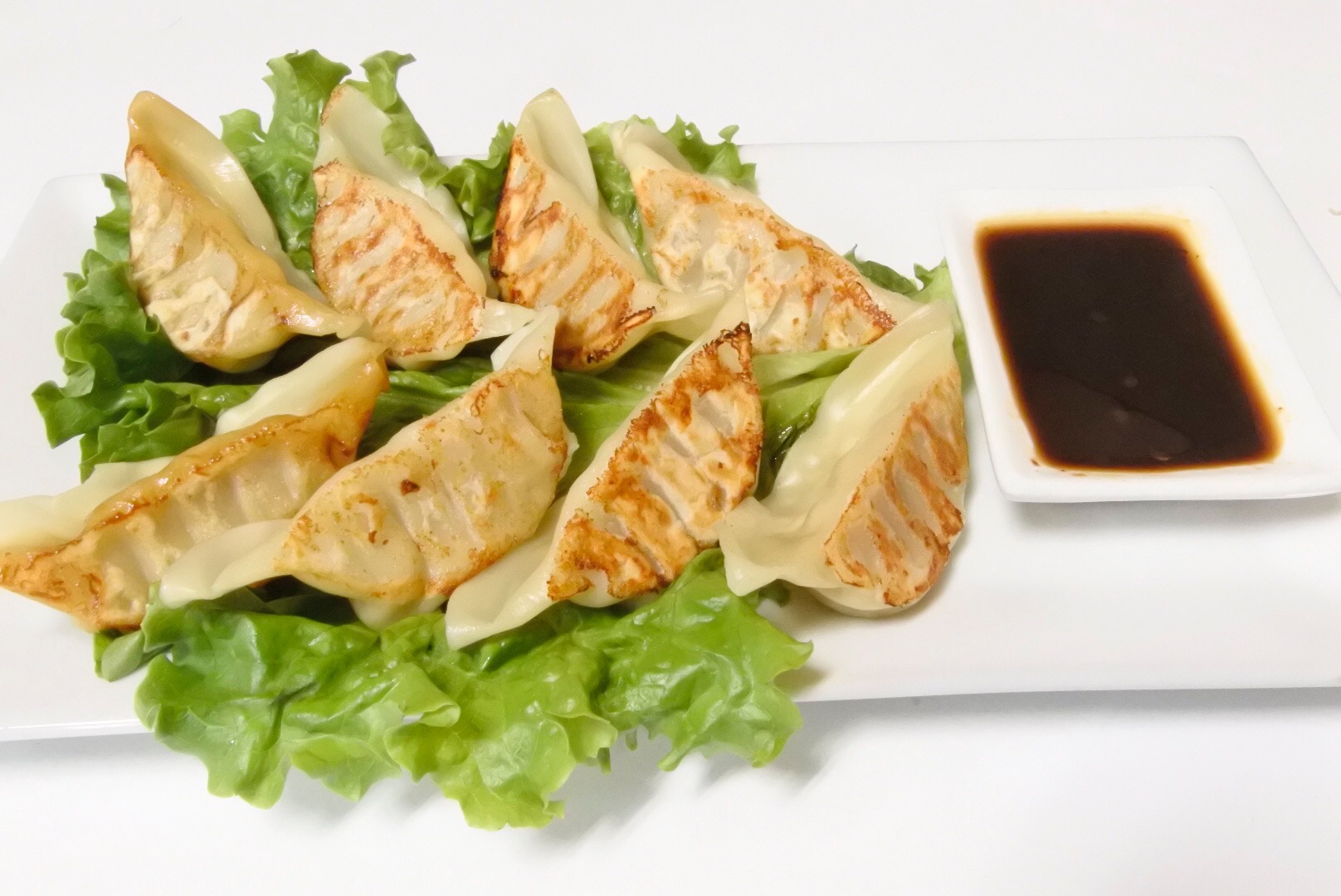 Order Pot Stickers (8) food online from Kanlaya Thai Restaurant store, Harrisburg on bringmethat.com